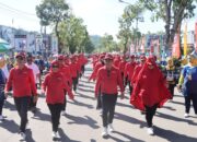Bupati dan Wakil Bupati Kolaka Ikut Lomba Gerak Jalan Bersama Pejabat Daerah